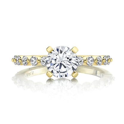 Yellow Gold And Diamond Ring set In A Shared Stle Setting