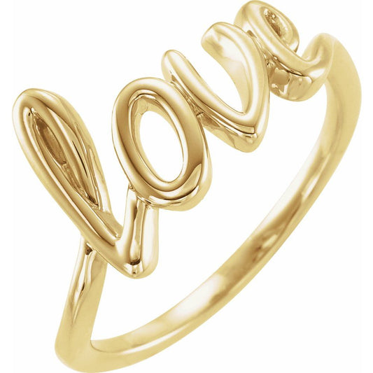 Gold ring with 'love' engraving on a white background