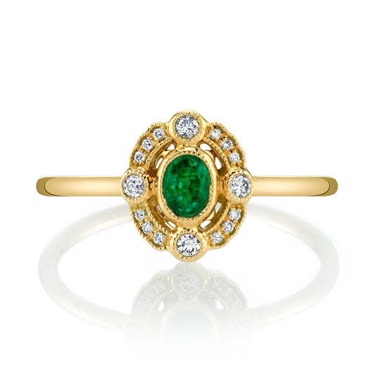 0.15 CRT Oval Emerald with Diamonds Yellow Gold Band